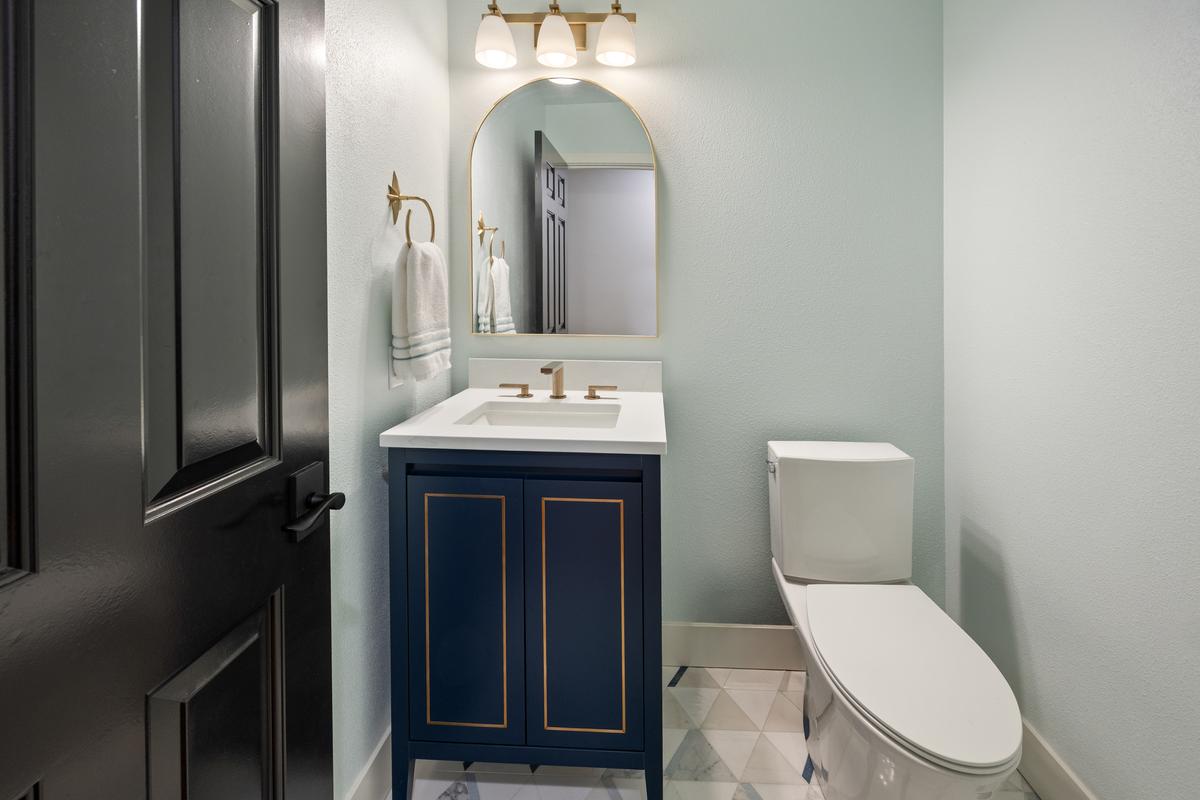Remodeled guest bathroom in Olympia featuring luxury finishes, modern vanity, and designer tile