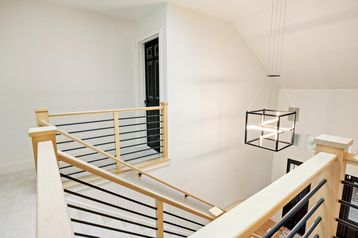 Remodeled luxury home exterior in Olympia with modern upgrades and custom architectural details