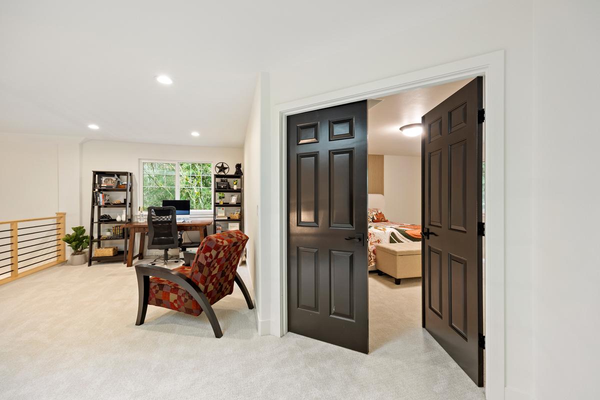 Remodeled luxury home exterior in Olympia with modern upgrades and custom architectural details