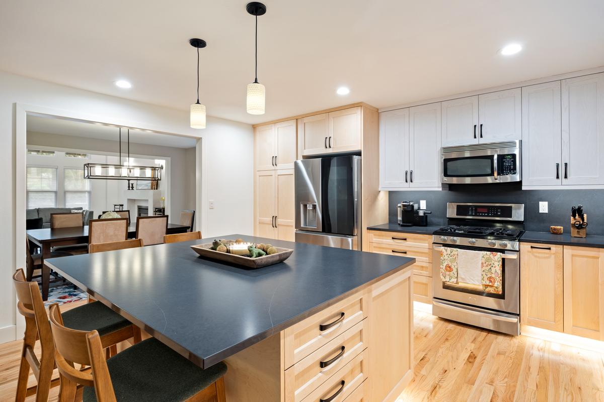 Luxury whole house remodel in Olympia featuring open-concept living, custom finishes, and high-end design kitchen